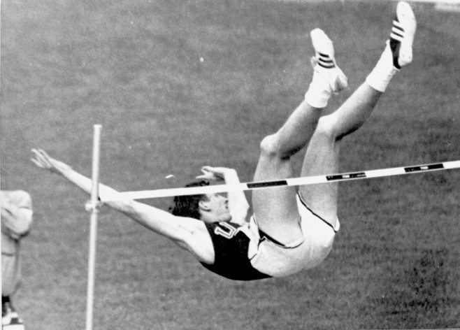 Dick Fosbury of USA, the high jumper who goes backwards over the bar, is seen during his Olympic record jump of 7ft 4 1/4 ins.
21st October 1968