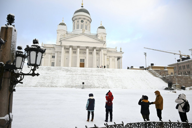 People at the Senate Square by the Helsinki Cathedral in freezing temperature in Helsinki, Finland on 3rd January, 2024.