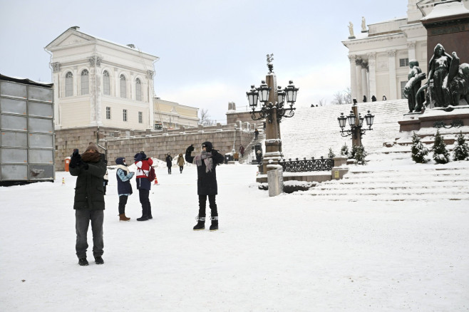 People at the Senate Square by the Helsinki Cathedral in freezing temperature in Helsinki, Finland on 3rd January, 2024.