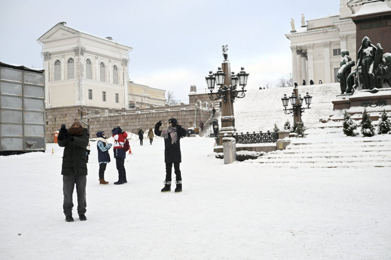 People at the Senate Square by the Helsinki Cathedral in freezing temperature in Helsinki, Finland on 3rd January, 2024.