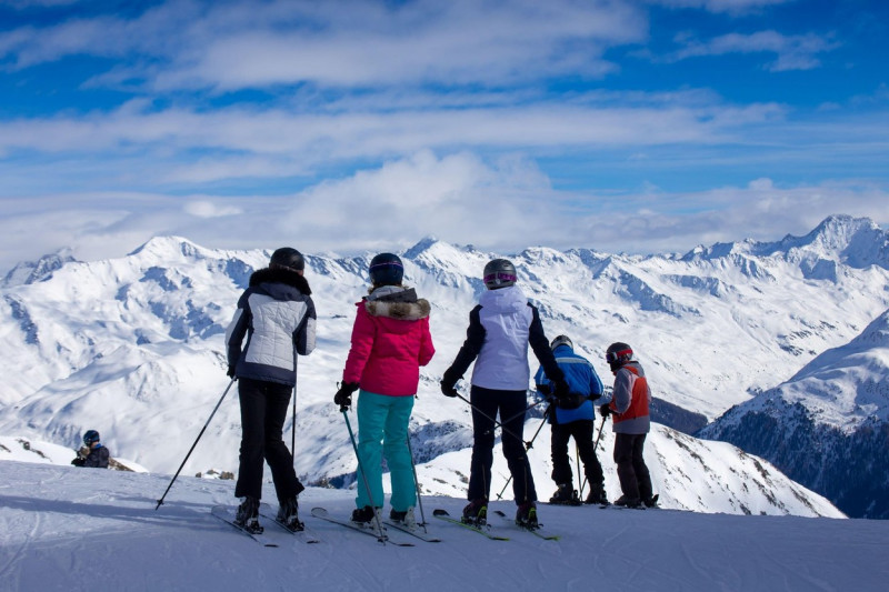 Parsenn ski resort, Davos: A group of skiers before the next descent