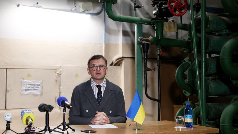Ukraine's Foreign Minister Dmytro Kuleba holds a joint press conference with his Japanese counterpart at a basement used as a bomb shelter during an air strike alarm in Kyiv on January 7, 2024