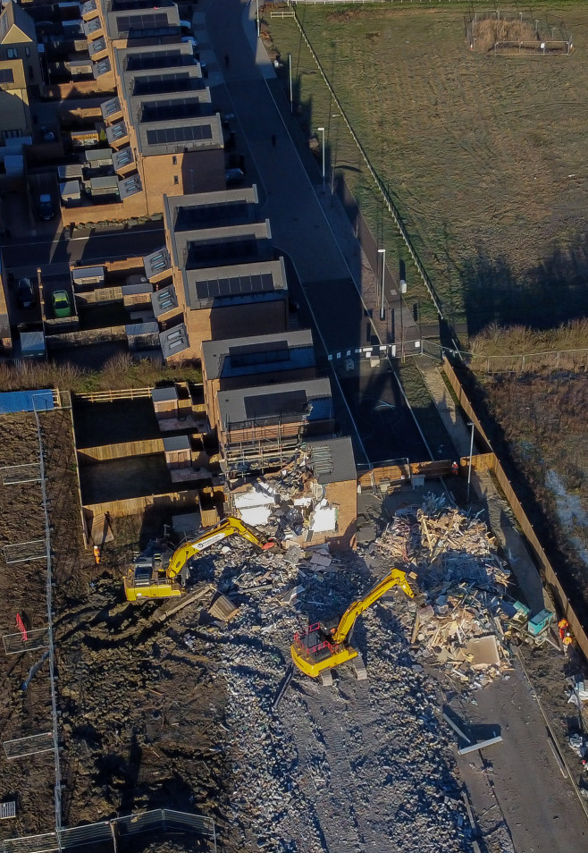 Demolition has started on over 80 houses at the Darwin Green development in Cambridge.