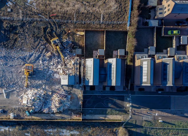 Demolition has started on over 80 houses at the Darwin Green development in Cambridge.