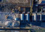 Demolition has started on over 80 houses at the Darwin Green development in Cambridge.