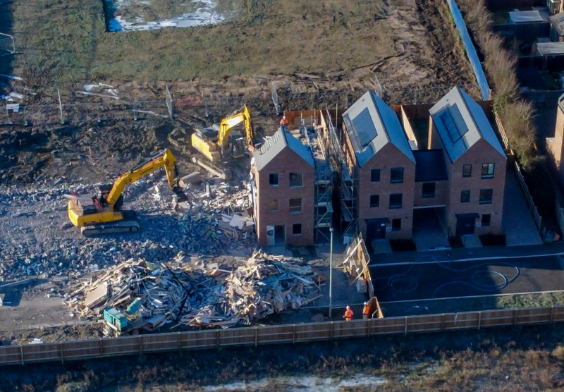 Demolition has started on over 80 houses at the Darwin Green development in Cambridge.