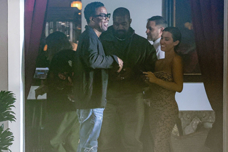 *PREMIUM-EXCLUSIVE* Kanye West shows off his $850k titanium dentures during outing with Bianca Censori and Chris Rock at Chateau Marmont. **WEB EMBARGO UNTIL 11:53 PM EST on January 18, 2024**