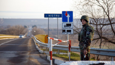 peacekeeper from the Moldovan Armed Forces is seen at the checkpoint in Tiraspol, Transnistrian region