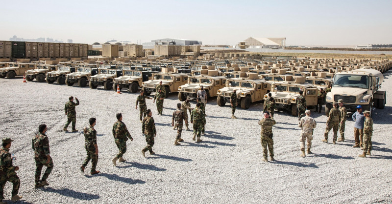 Erbil, Iraq. 22nd Sep, 2021. Kurdish soldiers with the Peshmerga Regional Guard Brigade inspect a shipment of American armored Humvee vehicles delivered from the Counter-ISIS Train and Equip Fund September 22, 2021 in Erbil, Iraq. Credit: Spc. Trevor Fran