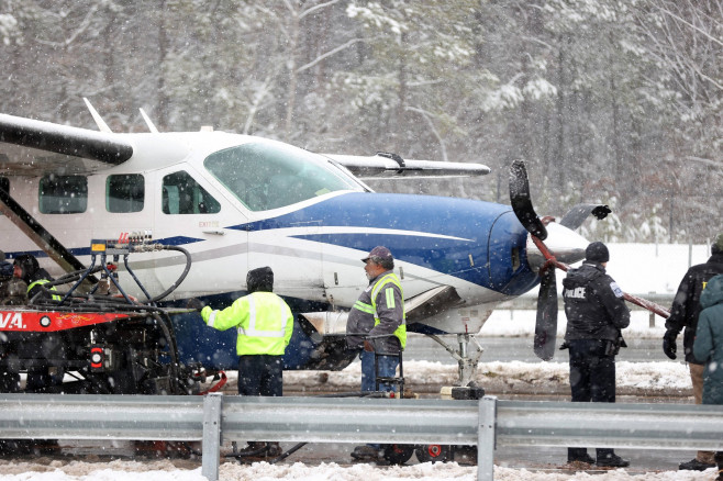 LOUDON COUNTY, PA - JANUARY 19: Emergency team on hand as a Cessna passenger plane headed for Lancaster, Pennsylvania ma