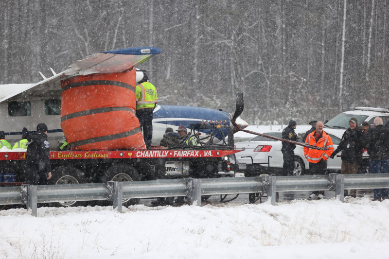 LOUDON COUNTY, PA - JANUARY 19: Emergency team on hand as a Cessna passenger plane headed for Lancaster, Pennsylvania ma