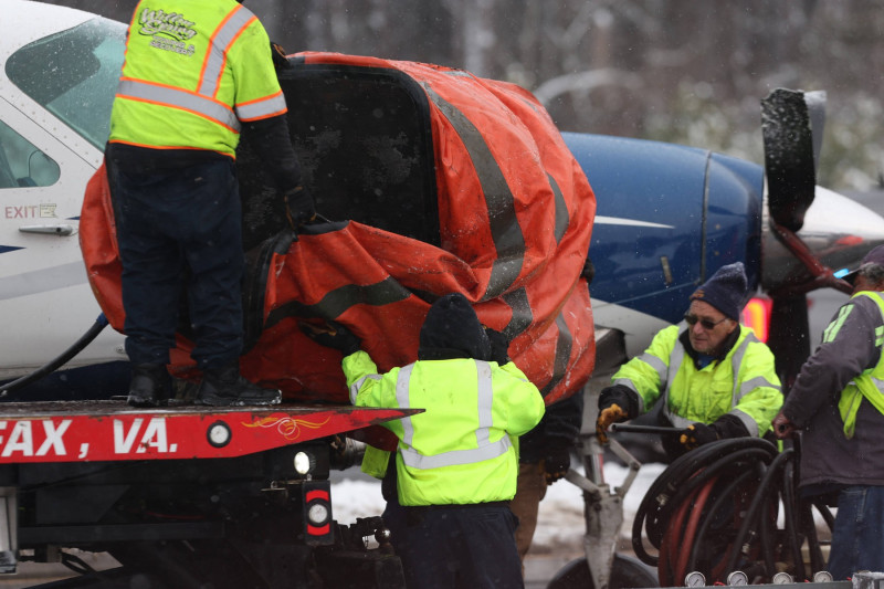 LOUDON COUNTY, PA - JANUARY 19: Emergency team on hand as a Cessna passenger plane headed for Lancaster, Pennsylvania ma