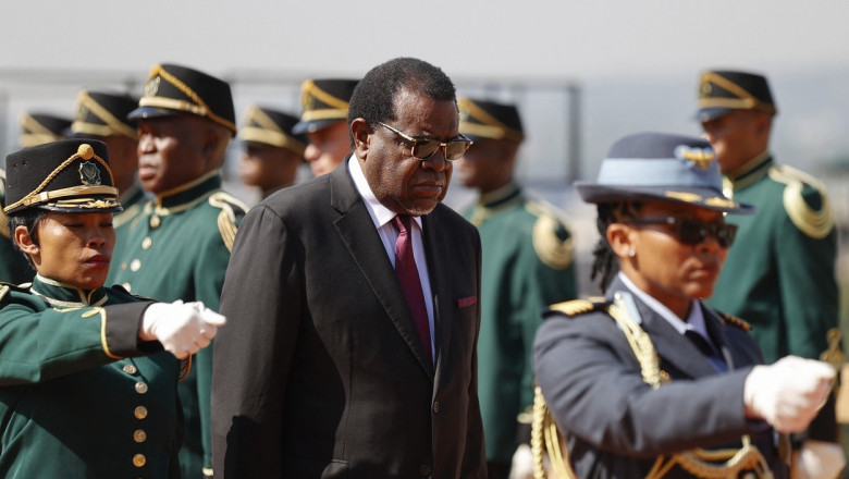 Namibia’s President Hage Geingob (R) inspects the guard of honour