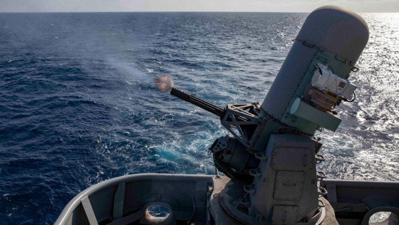 190601-N-YH603-1067 ARABIAN SEA (June 1, 2019) A close-in weapon system fires during training aboard the Wasp-class amphibious assault ship USS Kearsarge (LHD 3). Kearsarge is the flagship for the Kearsarge Amphibious Ready Group. The Kearsarge ARG and th