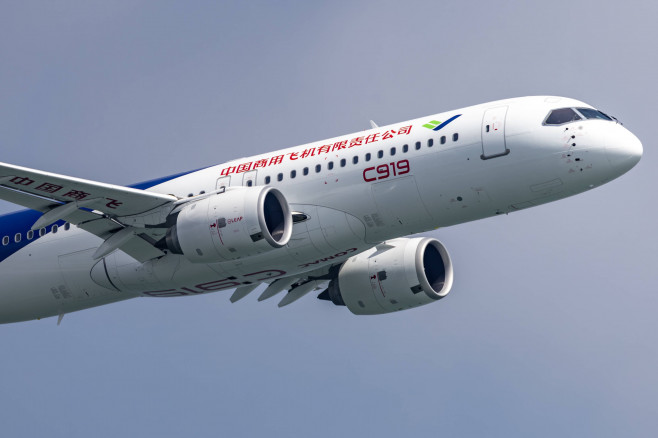 SINGAPORE, SINGAPORE - FEBRUARY 18: China s self-developed passenger jet C919 performs a rehearsal flight during a previ