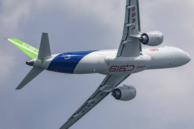 SINGAPORE, SINGAPORE - FEBRUARY 18: China s self-developed passenger jet C919 performs a rehearsal flight during a previ