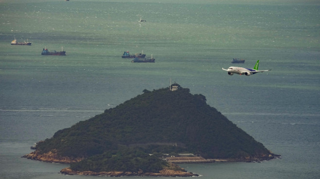 Mainland-made plane performs flypast over Victoria Harbour