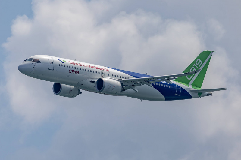 SINGAPORE, SINGAPORE - FEBRUARY 18: China s self-developed passenger jet C919 performs a rehearsal flight during a previ