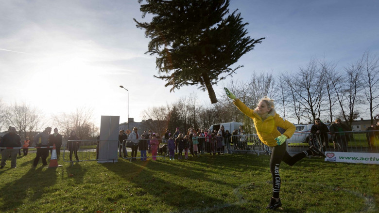 A mum who tried to claim £700,000 for injuries she suffered in a car crash has lost her case – after she was pictured winning a Christmas tree throwing competition.