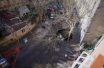 Italy, Naples: Cars swallowed by a huge sinkhole that opened up in a road in Naples's Vomero district