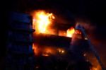 A large fire burns a 14-story building in the neighborhood of Campanar (Valencia).