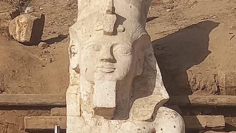 The undated photo shows the upper part of a full-body Ramses II statue discovered in Minya, Egypt