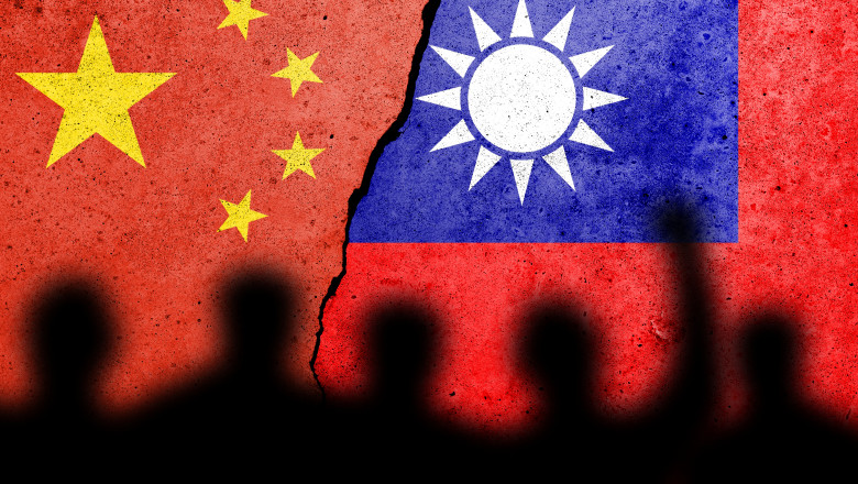 China,And,Taiwan,Flags,Painted,On,A,Concrete,Wall,With