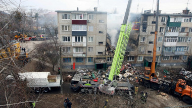 Rescuers use high-altitude equipment and special tools to searching for people under the rubble of a five-story residential building destroyed by one of the Shahed drones launched by Russian troops to attack Sumy, north-eastern Ukraine