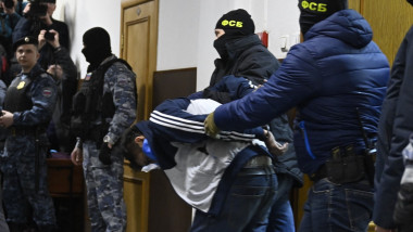 One of the suspects of the deadly terror attack on the Crocus City Hall is seen before appearing at the Basmanny District Court in Moscow, Russia on March 24,