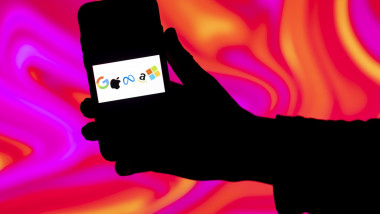 Google, Apple, Meta, Amazon, Microsoft, logo is seen displayed on a mobile phone screen