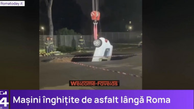 O gaură uriașă apărută brusc în asfalt a înghițit două mașini, lângă Roma