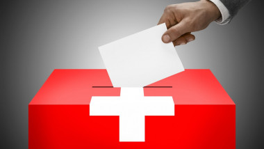 Ballot box painted into national flag colors - Switzerland