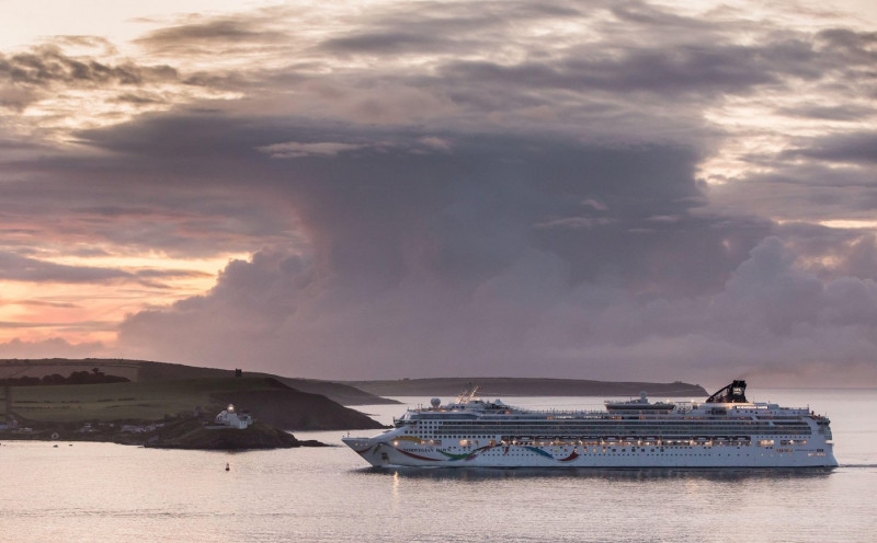 Roches Point, 01st September, 2023. Cruise ship Norwegian Dawn nears Roches Point before sunrise while on her way for a day visit to Cobh, Co. Cork, Ireland. - Credit: David Creedon / Alamy Live News