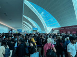 Chaos in Dubai airport as tourists try to escape flooded city - with ‘food running out’ and 'people sleeping on airport floor'