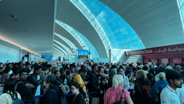 Chaos in Dubai airport as tourists try to escape flooded city - with ‘food running out’ and 'people sleeping on airport floor'