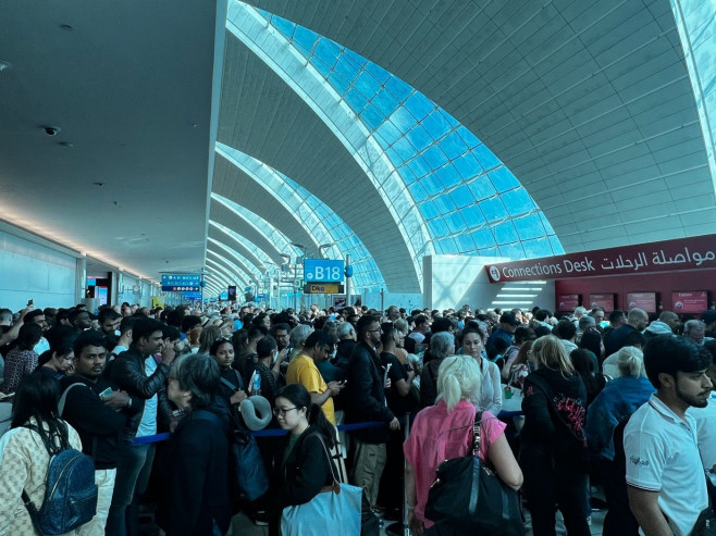 Chaos in Dubai airport as tourists try to escape flooded city - with ‘food running out’ and 'people sleeping on airport floor'