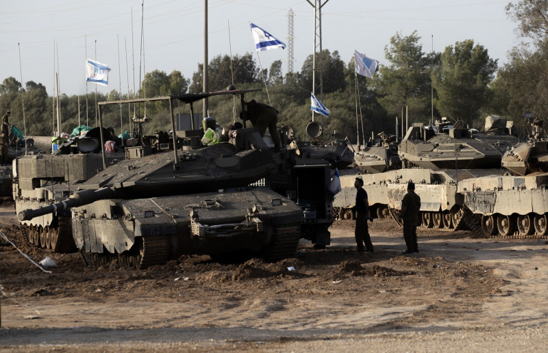 IDF tanks in staging area along Gaza Strip border..