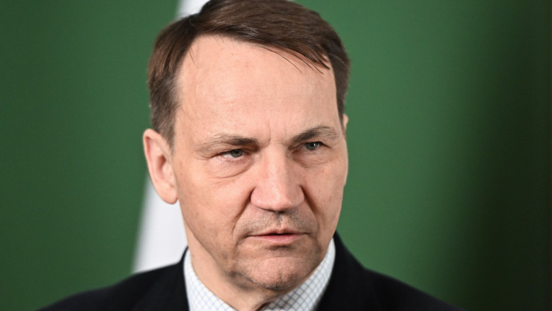 ministrul polonez de externe, Radek Sikorski,