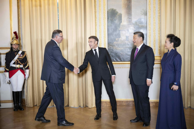 France's President Emmanuel Macron, Chinese President Xi Jinping during presentations ahead of an official state dinner