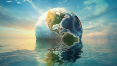 ilustrație cu planeta Pământ care se scufundă în ocean