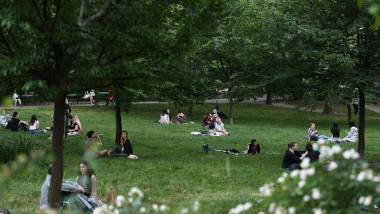 Bucharest, Romania - 16 May 2020: People in Cismigiu Park on the second day of relaxation of the measures taken by the authorities against the COVID-1