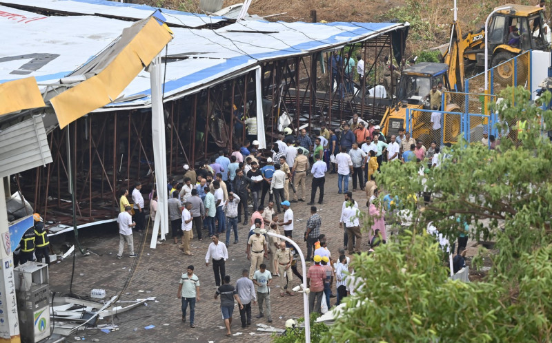 MUMBAI, INDIA - MAY 13: Ongoing rescue operation held by Mumbai Fire Brigade, NDRF, Mumbai Police and BMC at site after