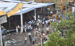 MUMBAI, INDIA - MAY 13: Ongoing rescue operation held by Mumbai Fire Brigade, NDRF, Mumbai Police and BMC at site after