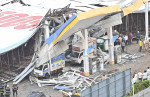 MUMBAI, INDIA - MAY 13: Ongoing rescue operation held by Mumbai Fire Brigade, NDRF, Mumbai Police and BMC at site after