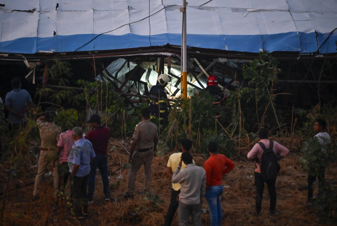 MUMBAI, INDIA - MAY 13: Ongoing rescue operation held by Mumbai Fire Brigade, NDRF, Mumbai Police and BMC at site after