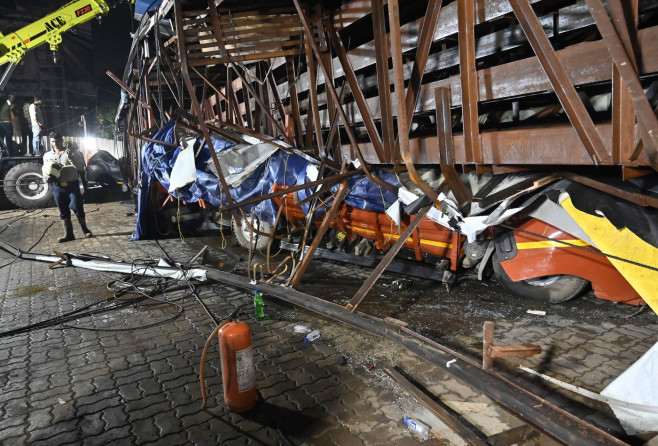 MUMBAI, INDIA - MAY 13: Ongoing rescue operation held by Mumbai Fire Brigade, NDRF, Mumbai Police and BMC at site after