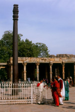 India: The almost 2,000 year old Iron Pillar at the Qutb Minar complex, Delhi