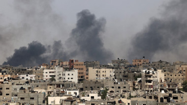 Smoke billows after an Israeli strike on Jabalia as seen from Beit Lahia, in the northern Gaza Strip