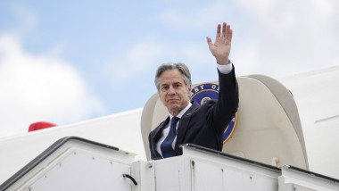 US Secretary of State Antony Blinken waves as he disembarks from the plane upon his arrival to the international airport in the Moldovan capital Chisinau on May 29, 2024