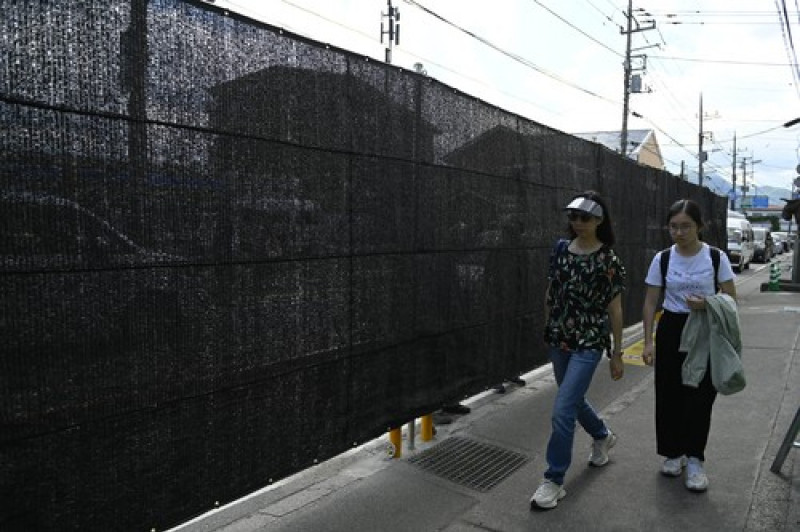 A black screen built to dissuade tourists from taking photos of Mount Fuji in Japan